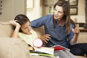 Is the Problem Really ADHD? 1 Teacher working with a student