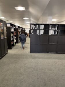 hallway with bookcases at Irvine