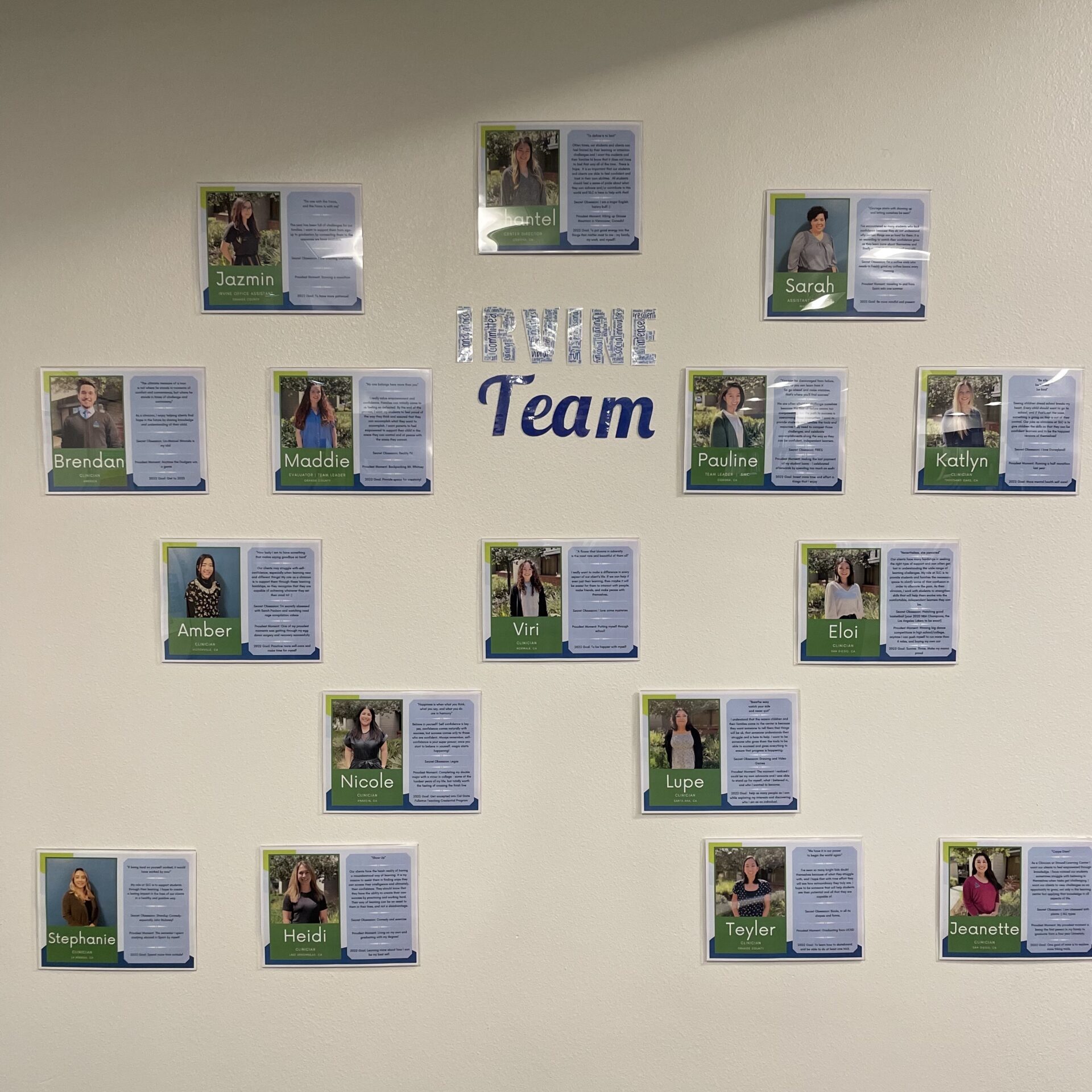 Wall showcasing photos of clinicians at Irvine