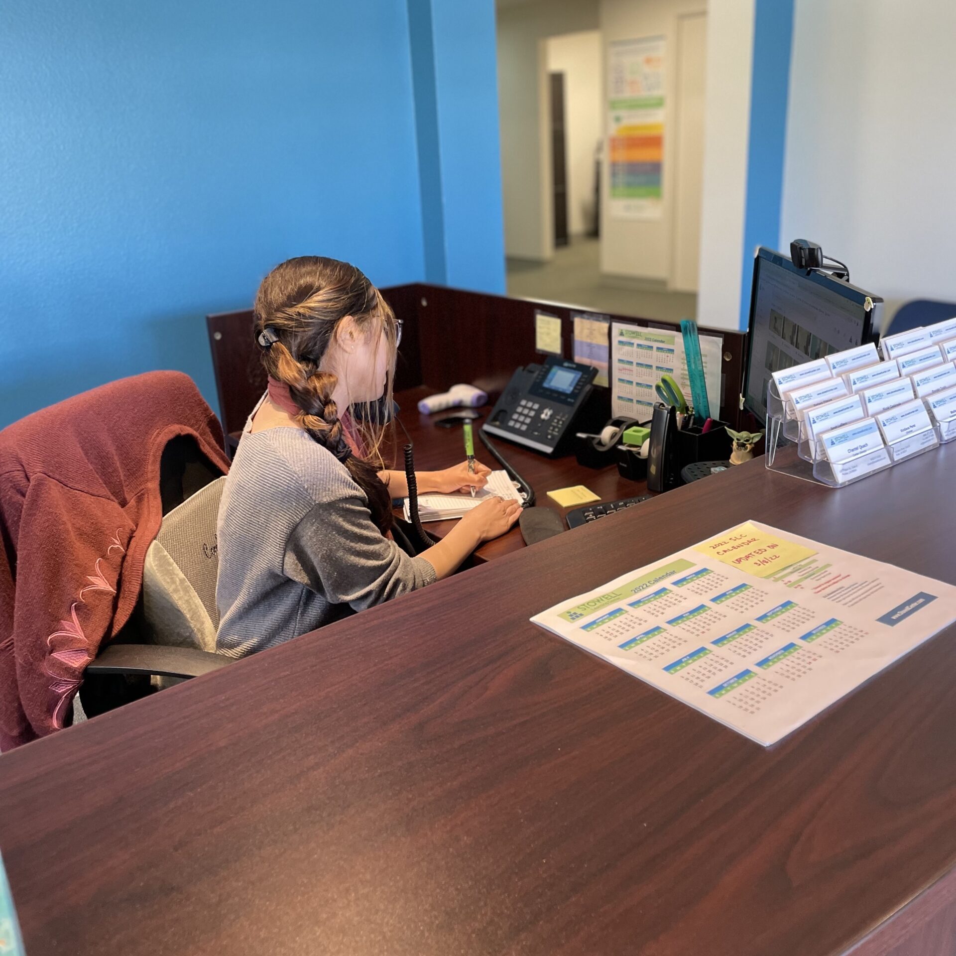 lady working at the front desk in Irvine